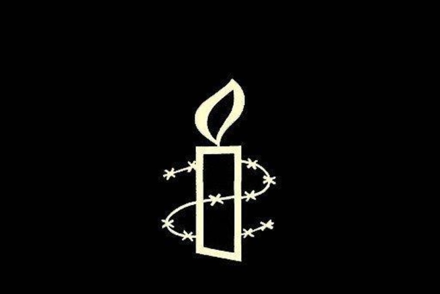 شعار منظمة العفو الدولية (أ ف ب)